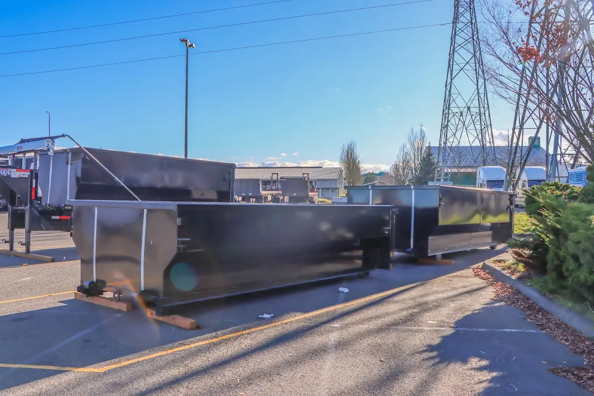 Roll-off dumpster ready for waste disposal at job site for Roll Off Dumpster Rental in Westerly